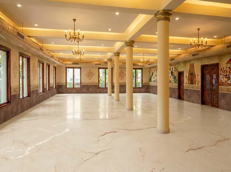 Marble dining hall with brass chandeliers and traditional murals